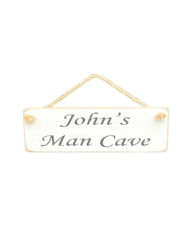 30cm x 10cm, solid wood decorative personalised shed sign, handmade in the UK by Austin Sloan with a personalised Man Cave quote "John's Man Cave" in a antique white colour