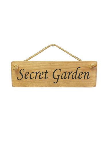 30cm x 10cm, solid wood decorative garden sign, handmade in the UK by Austin Sloan with a garden quote "Secret Garden" in a natural wood colour