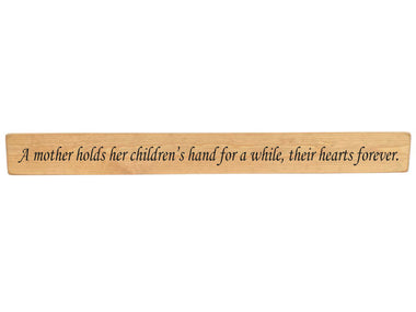 A mother holds Wooden Wall Art Gift Sign