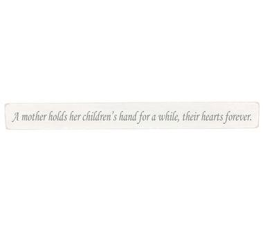 A mother holds Wooden Wall Art Gift Sign
