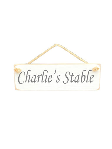 30cm x 10cm, solid wood decorative personalised stable sign, handmade in the UK by Austin Sloan with a personalised horse lovers quote "Charlie's Stable" in a antique white colour