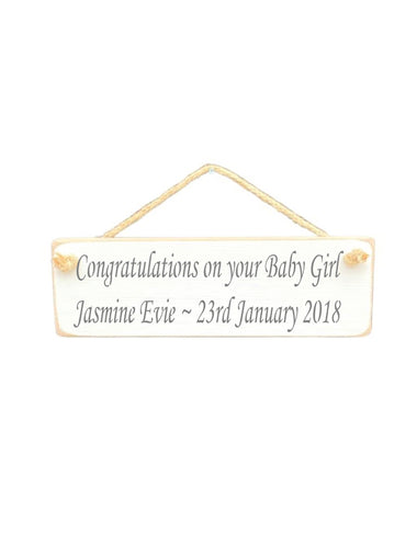 30cm x 10cm, Solid wood decorative personalised baby sign, handmade in the UK by Austin Sloan with a personalised congratulations baby girl quote "Congratulations on your Baby Girl Jasmine Evie ~ 23rd January 2018" in a antique white colour