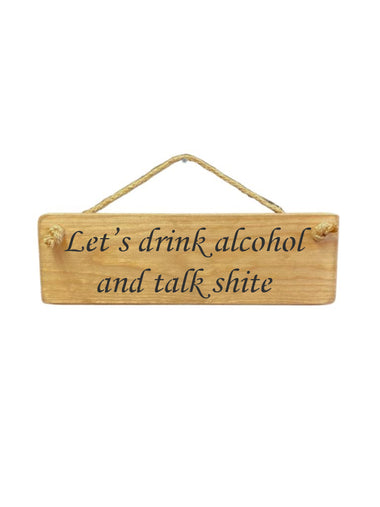 30cm x 10cm, solid wood decorative alcohol sign, handmade in the UK by Austin Sloan with a humorous quote "Let's drink alcohol and talk shite" in a natural wood colour