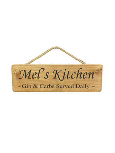 30cm x 10cm, solid wood decorative personalised kitchen sign, handmade in the UK by Austin Sloan with a personalised gin lovers quote "Mel's Kitchen Gin & Carbs Served Daily" in a natural wood colour