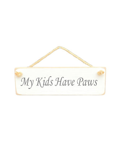 30cm x 10cm, Solid wood decorative living room sign, handmade in the UK by Austin Sloan with a humorous quote "My Kids Have Paws" in a antique white colour