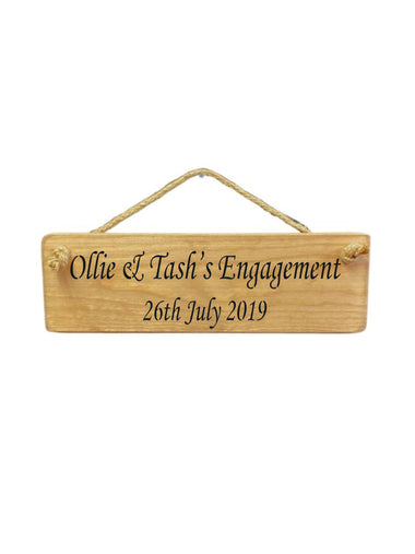 30cm x 10cm, solid wood decorative personalised engagement sign, handmade in the UK by Austin Sloan with a personalised quote "Ollie & Tash's Engagement 26th July 2019" in a natural wood colour