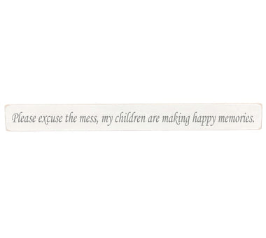 90cm x 10cm, Solid wood decorative living room sign, handmade in the UK by Austin Sloan with a true inspirational quote "Please excuse the mess, my children are making happy memories." Antique white wood with black wording