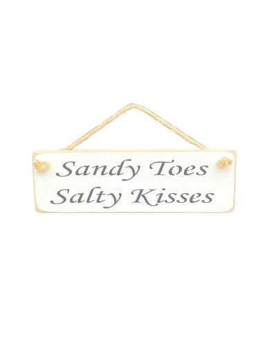 30cm x 10cm, solid wood decorative beach lovers sign, hand made in the UK by Austin Sloan with a garden quote "Sandy Toes Salty Kisses" in a antique white colour
