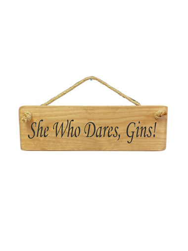 30cm x 10cm, solid wood decorative gin lovers sign, handmade in the UK by Austin Sloan with alcohol lovers quote "She Who Dares, Gins!" in a natural wood colour