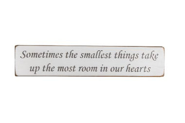 Sometimes the smallest things take up the most room in our hearts 45cm wood sign