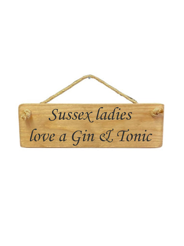 30cm x 10cm, Solid wood decorative personalised kitchen sign, handmade in the UK by Austin Sloan with a personalised gin lovers quote "Personalised Area ladies love a Gin & Tonic" in a natural wood colour