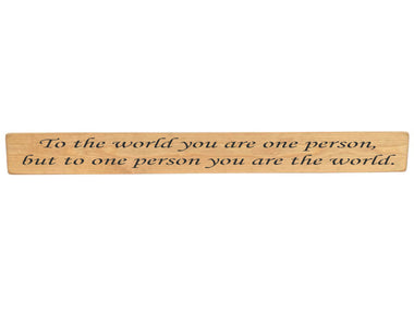 90cm x 10cm, Solid wood decorative living room sign, handmade in the UK by Austin Sloan with a inspirational quote "To the world you are one person, but to one person you are the world." Natural wood with black wording