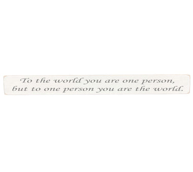 90cm x 10cm, Solid wood decorative living room sign, handmade in the UK by Austin Sloan with a inspirational quote "To the world you are one person, but to one person you are the world." Antique white wood with black wording