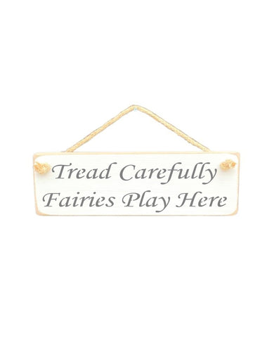 30cm x 10cm, solid wood decorative garden sign, handmade in the UK by Austin Sloan with a children's garden sign "Tread Carefully Fairies Play Here" in a antique white colour